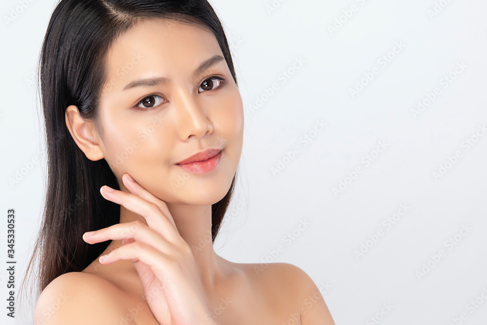 Beautiful Young Asian Woman with Clean Fresh Skin. Face care, Facial treatment, Cosmetology, beauty and healthy skin and cosmetic concept, woman beauty skin isolated on white background Beautiful Young Asian Woman with Clean Fresh Skin. Face care, Facial treatment, Cosmetology, beauty and healthy skin and cosmetic concept, woman beauty skin isolated on white background