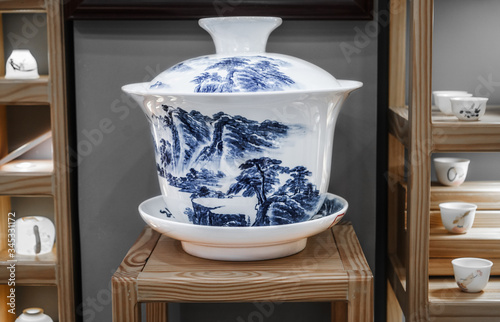 Gaiwan for chinese tea ceremony. Cup with a lid for brewing tea . Jingdezhen porcelain. photo