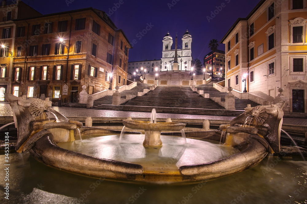 Naklejka premium fountain at night in Rome