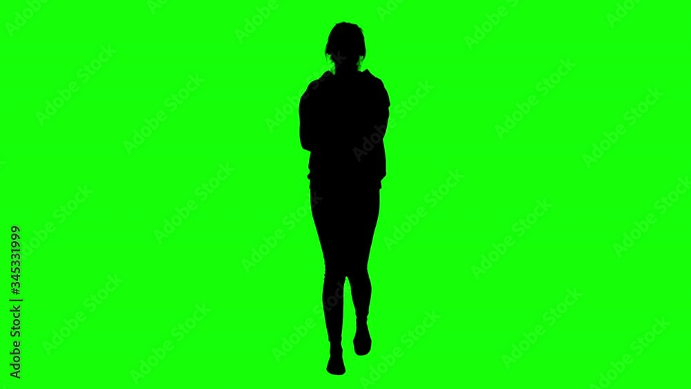 Girl Walking in a Hoodie with Crossed Arms Green Screen Silhouette Girl Walking in a Hoodie with Crossed Arms Green Screen Silhouette