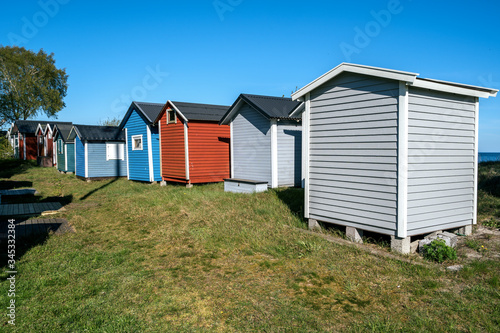 Small beach houses in Ystad city in Skane, Sweden © Elena Sistaliuk