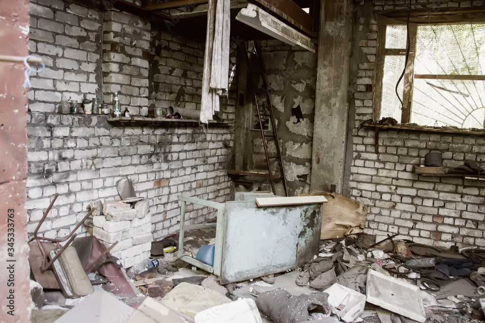 The ruins of an old abandoned house - image.