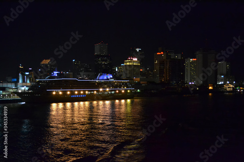 night panorama with cruise ship near town. night light on cruise ship