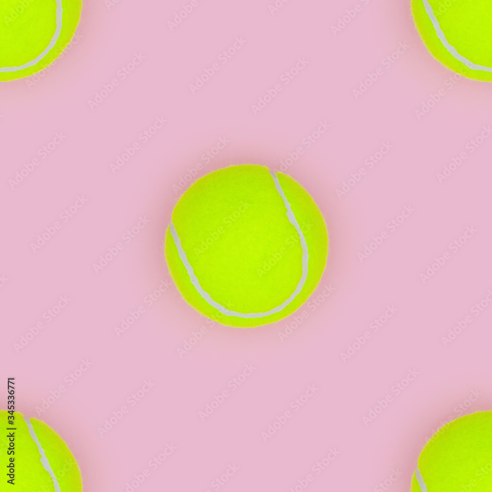 Seamless pattern. Tennis ball on pink background.