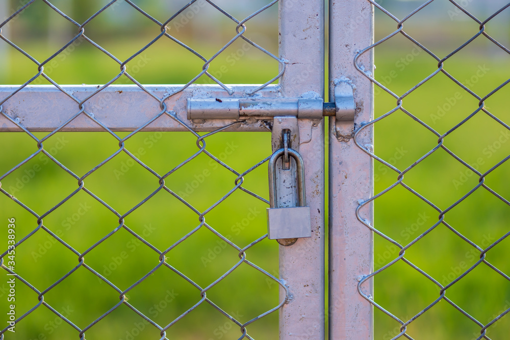The keys at the outdoor sports gate lock. The keys at the outdoor sports gate lock.