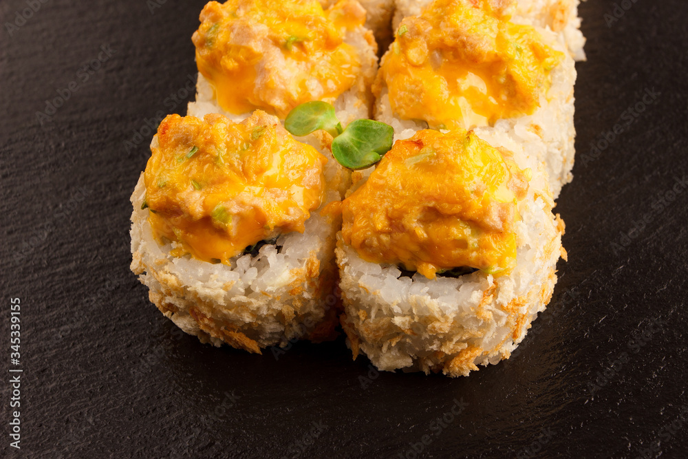 Japanese food: Set of salmon sushi and rolls with salmon and eel Japanese food: Set of salmon sushi and rolls with salmon and eel