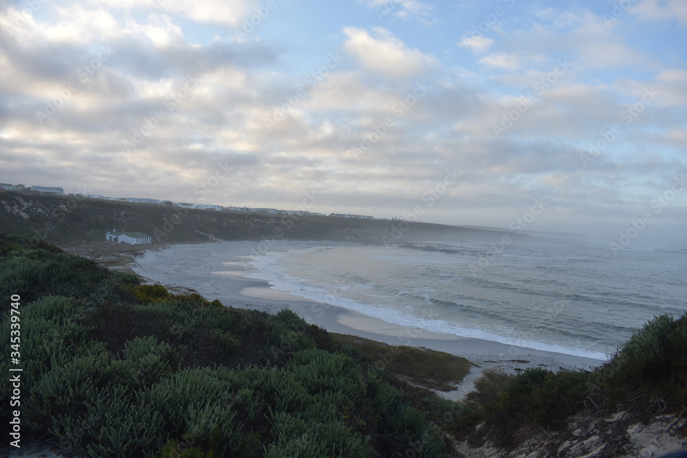 Early morning, bayview of beach and old house Early morning, bayview of beach and old house