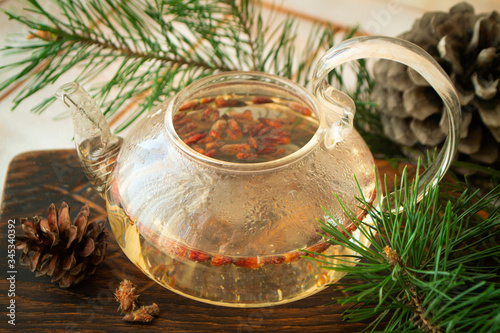 medicinal decoction with pine buds. Herbal tea, organic food photo