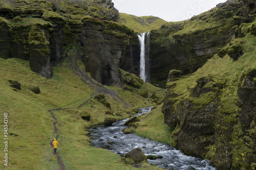 waterfall in the valley. located in iceland. you can go behind the waterfall. valley with waterfall like from a movie. Icelandic dream.