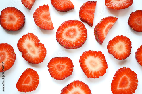 Strawberry slices as seamless pattern isolated on white background