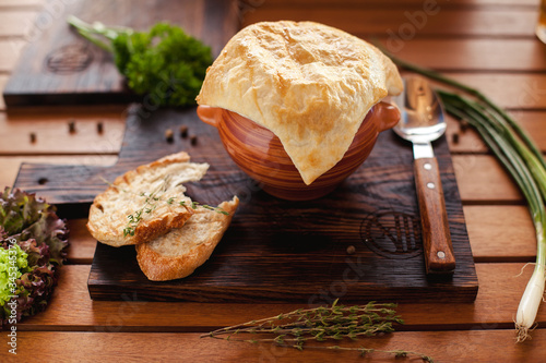cheese soup with croutons in a pot