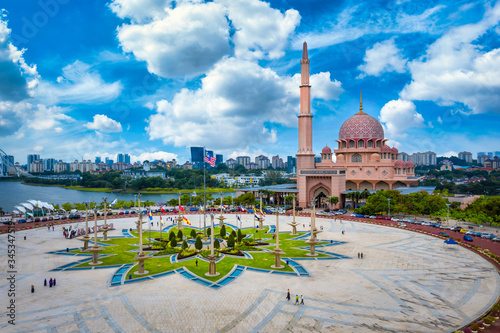Photography Aerial View Of Putra Mosque with Putrajaya City Centre with Lake at sunset in Putrajaya, Malaysia