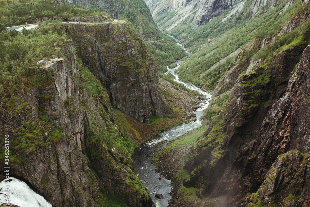 mountain landscape of norway with a waterfall