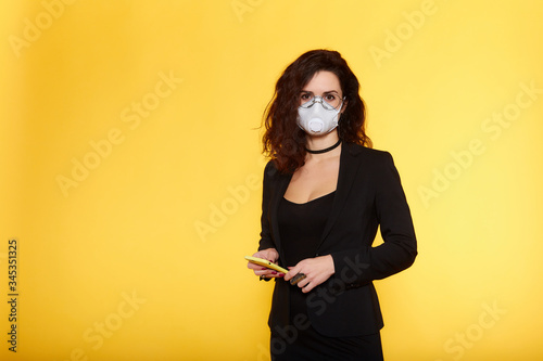 Business woman in glasses  wearing protective mask to Prevention for Coronavirus or Covid-19 Outbreak Situation - Concept, contagious disease, healthcare and Business.  Brunette © AlexanderBee 