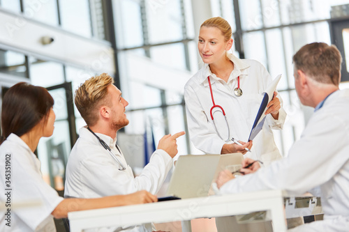 Group doctors at a team meeting