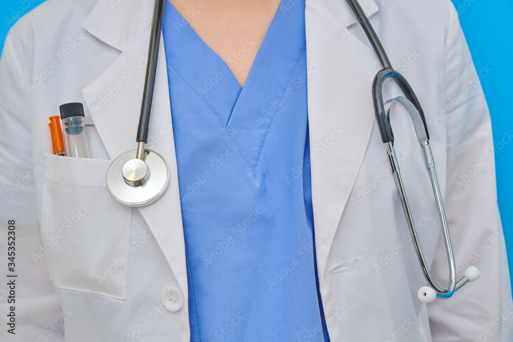 Doctor's clothing with syringes and test tube in the pocket, close-up. The body of a nurse in a dressing gown and uniform, front view. Doctor's clothing with syringes and test tube in the pocket, close-up. The body of a nurse in a dressing gown and uniform, front view.