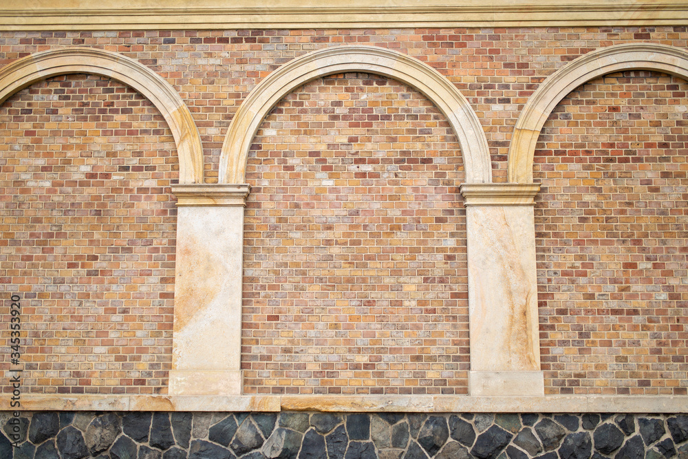 Obraz premium brick wall with arches texture