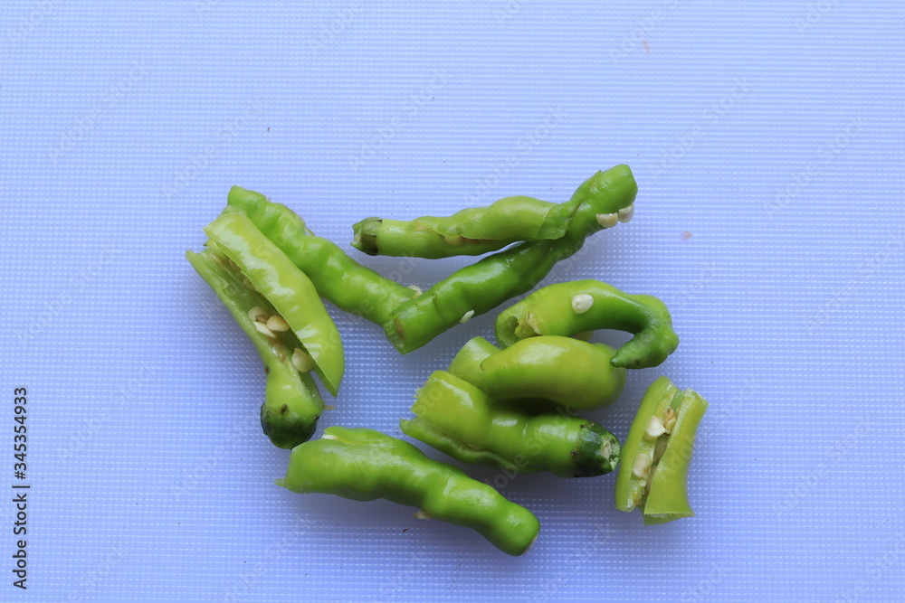 green cayenne pepper with a white background
green cayenne pepper with a white background