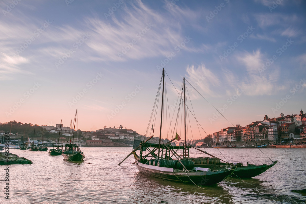 Panoramic landscape view on the old town with Douro river in Porto city during the sunset in Portugal