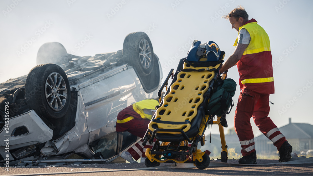 Paramedics and Firefighters Arrive On the Car Crash Traffic Accident
