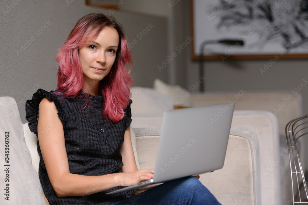 Portrait of beautiful businesswoman using laptop and working from home Portrait of beautiful businesswoman using laptop and working from home