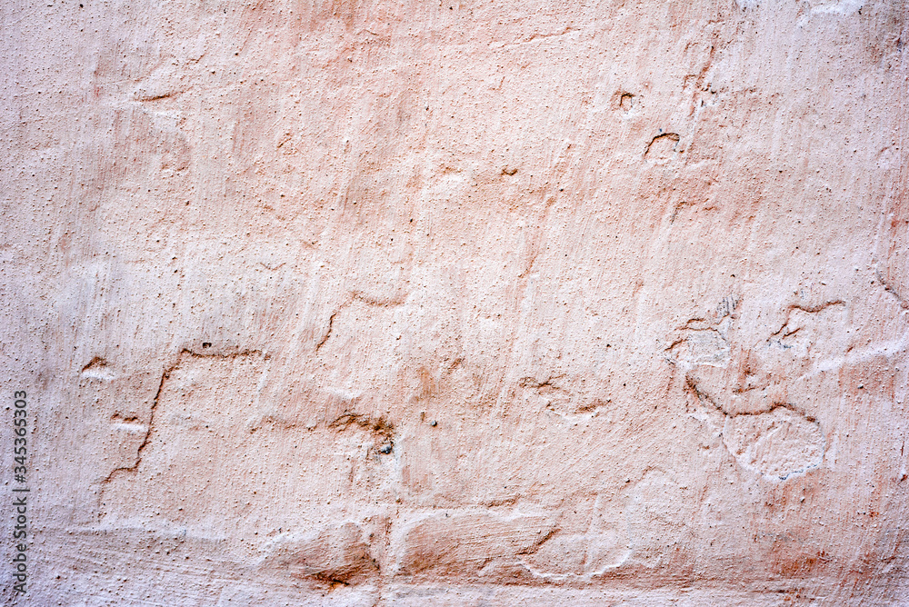 Naklejka premium Texture of a concrete wall with cracks and scratches which can be used as a background