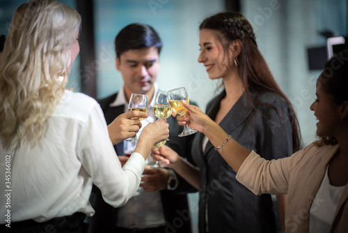 Business partners toast cha...