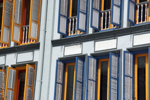 colorful wooden window shutters in singapore