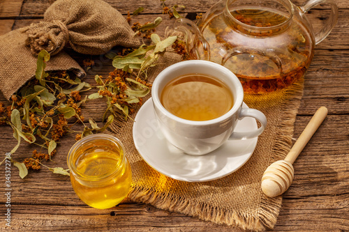 Linden tea. Dry fragrant flowers. Sunny morning breakfast. Hot drink to strengthen the immune system, alternative medicine