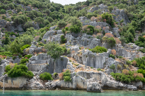 Ruins of sunken ancient city of Dolichiste on the northern part of the Kekova Island. Devastating earthquake in the 2nd century AD photo