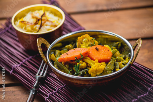 Traditional indian cuisine samosas  naan curry masala biryani rice kitchen towel panir tikka