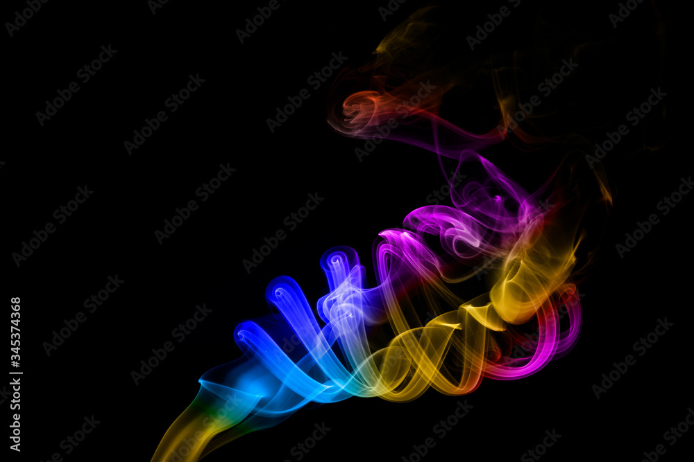 Obraz premium Abstract colored smoke on black background