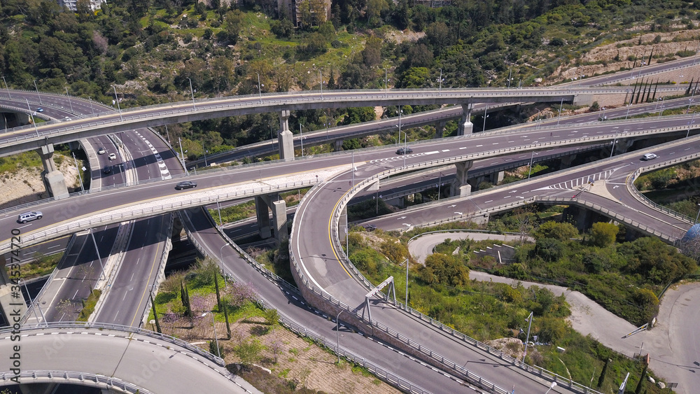 Aerial view of highway road, interchange and overpass in city. Aerial view of highway road, interchange and overpass in city.
