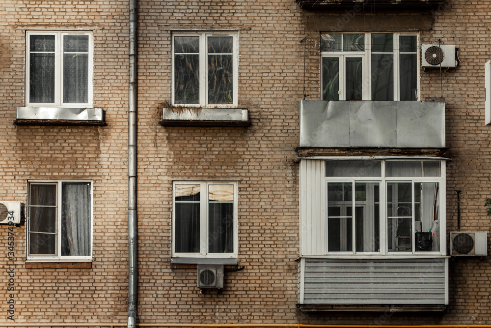 Obraz premium Old Khrushchev Moscow. Historic houses in the center of Russia. Facade of a residential building. Sight.