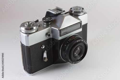 The old Soviet SLR camera on grey background