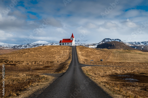 Panoramic view of Ingjaldsholskirkja church in Hellissandur, Iceland. Incredible Image of Icelandic landscape and architecture. Isolated church in a scenery of Scandinavia photo