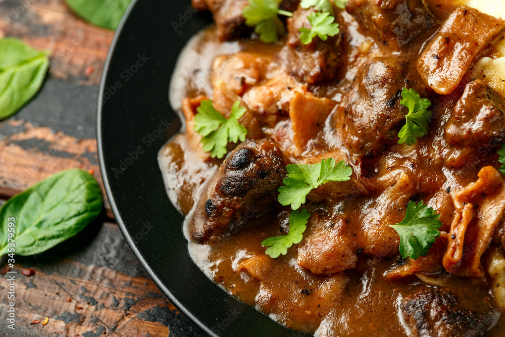 Fototapeta premium Fried Liver, bacon in onion gravy with mashed potato