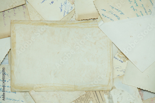 Background consisting of old, yellowed photographs.