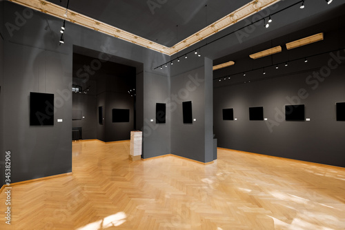empty showroom or room in gallery with colorful painted walls and picture frames mock-up photo