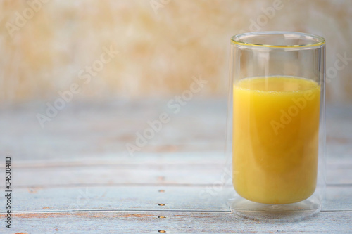 orange juice  on the table with copy space