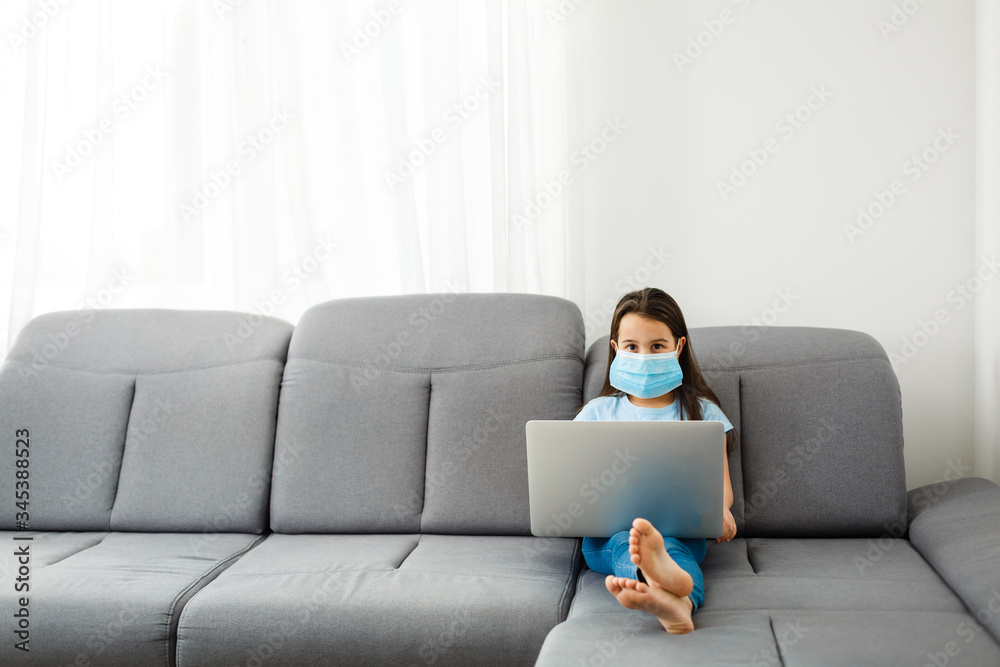 Little Girl Using Digital Laptop E-learning Concept. little girl children using laptop computer, studying through online e-learning system. Little Girl Using Digital Laptop E-learning Concept. little girl children using laptop computer, studying through online e-learning system.