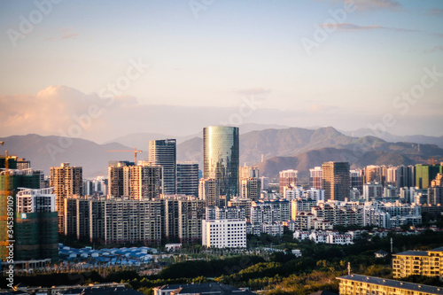 Cityscape at sunset in the city of Sanya. Hainan island