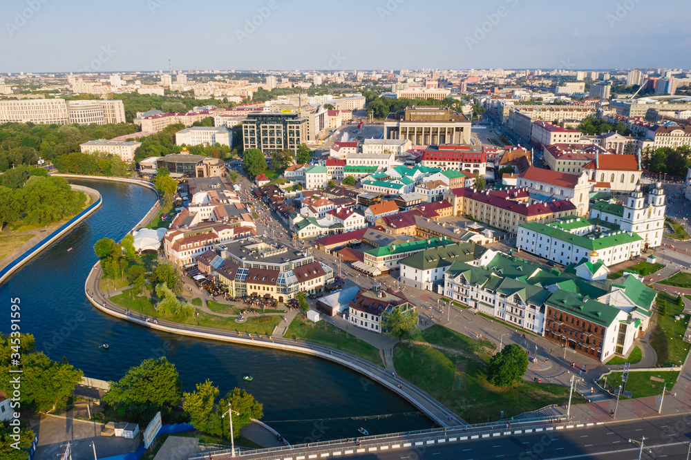 Fototapeta premium MINSK, BELARUS - JULY 2019: Aerial View, Cityscape Of Minsk, Belarus. Summer Season, Sunset Time. Panorama Of Nemiga District.