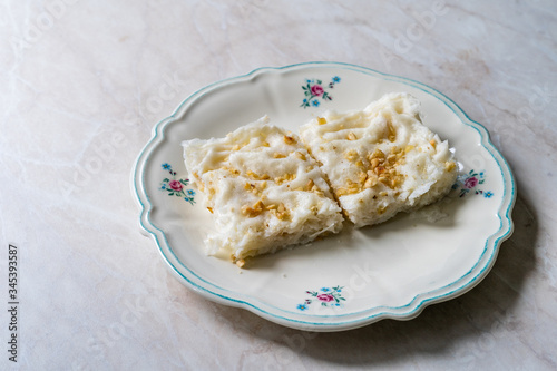 Traditional Turkish Ramadan Dessert Gullac . It is made with gullac (rice wafer or rice paper sheets) , milk, rose water, walnut, vanilla. photo