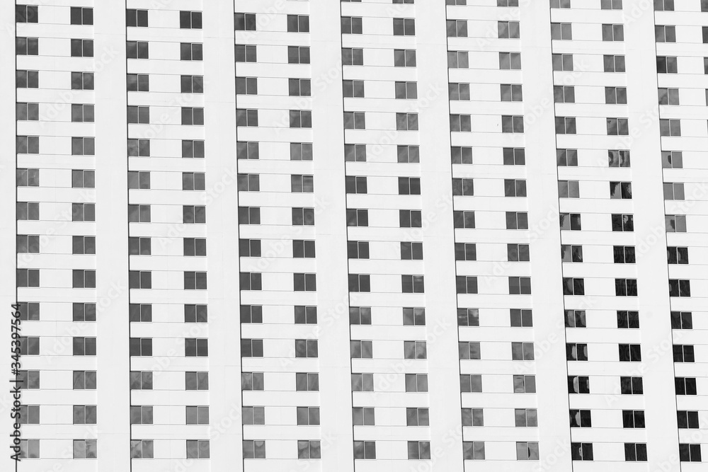 Black and white pattern formed by windows of rooms in a hotel