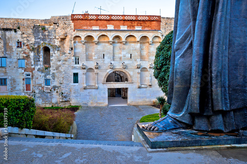 Split old town gate and Grgur Ninski statue famous thumb view photo
