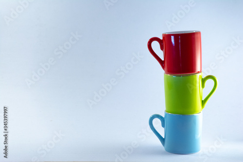 Isolated colorful coffee cups on white background