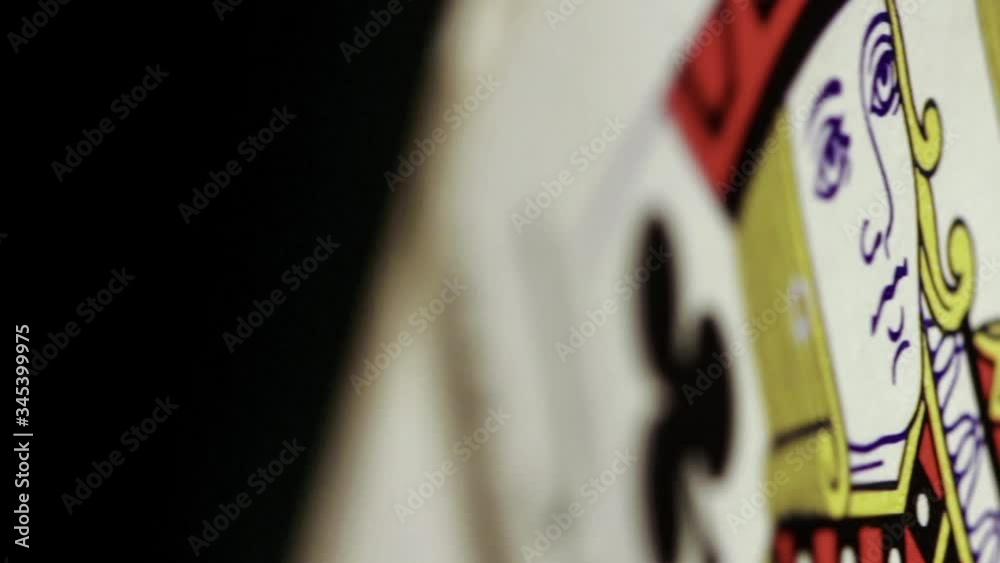 macro of a jack of clubs rotating into focus macro of a jack of clubs rotating into focus