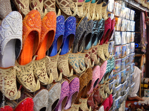 Khussa colorful shoes at cultural place Old Souk, Dubai, UAE.