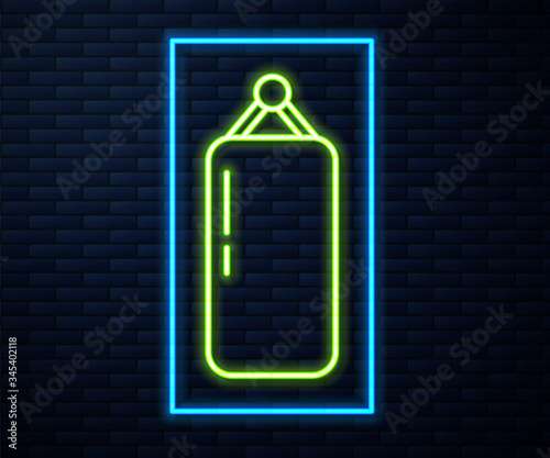 Glowing neon line Punching bag icon isolated on brick wall background.  Vector Illustration